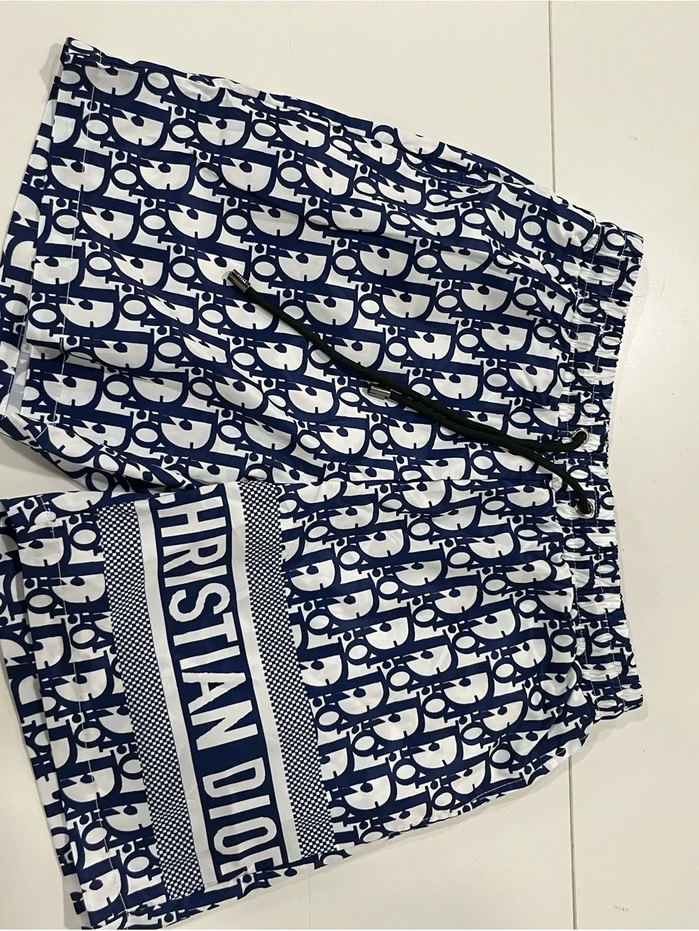 DlOR swim trunks blue and white